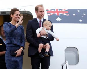 Catherine, Duchess of Cambridge, Prince William, Duke of Cambridge and Prince George of Cambridge...