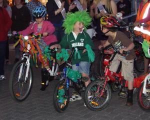 Chatto Creek rider Hamish Payne (6, centre), shares a laugh with Caleb Millar (6), of Alexandra,...