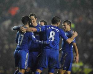 Chelsea's Fernando Torres (2nd L) celebrates scoring against Leeds United during their English...