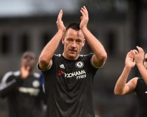 Chelsea's John Terry applauds fans at the end of the match. Photo: Reuters