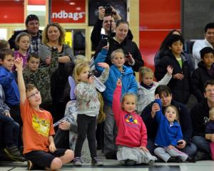 Children are quick to volunteer at the Cadbury Chocolate Fun Day in the Meridian mall in Dunedin...