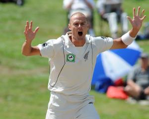 Chris Martin reacts while bowling against Pakistan during the first test in Hamilton earlier this...