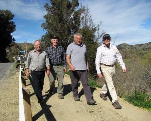 Clutha Gold Trail Charitable Trust members (from left) Stu Edgecumbe, of Roxburgh East, chairman...