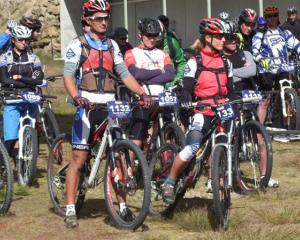 Competitors wait for the start of the Big Easy mountain bike race on the Pisa range on Saturday....