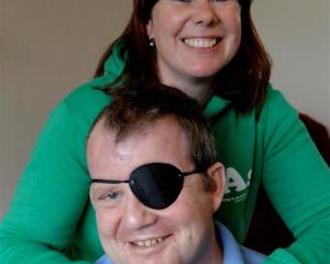 Crash survivor Mark Halliwell and his partner Anna Morgan before leaving Dunedin yesterday. Photo...