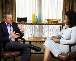 Cyclist Lance Armstrong is interviewed by Oprah Winfrey in Austin, Texas in theis handout photo...