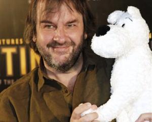 Peter Jackson poses during the photo call of the film ''The Adventures of Tintin: Secret of the...