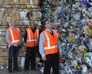 Dunedin City Council solid waste manager Ian Featherston examines the 120-tonne pile of...