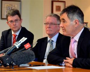 Dunedin Mayor Dave Cull discusses the cost of the Carisbrook deal yesterday, watched by (from...