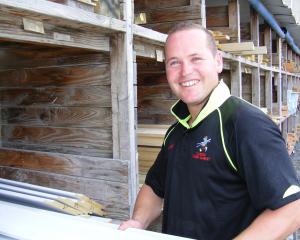 Knowledge and experience: Dunedin Timber Market manager Jared Greaves helps a customer with a...