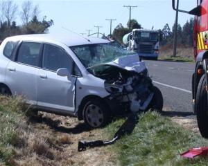 Emergency services attend an accident on State Highway 1, north of Oamaru, in which Allan and...