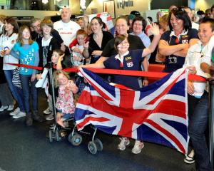 England rugby team supporters show their true colours while greeting their Rugby World Cup heroes...