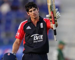 England's Alsatair Cook celebrates after reaching his century during the second one-day...