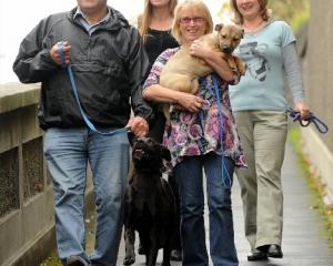 Enjoying saving condemned dogs from the pound are (from left) Dog Rescue Dunedin foster parent...