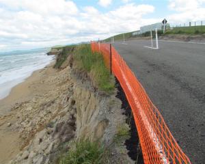 Erosion encroaches on Waianakarua Rd. Photo by Andrew Ashton.