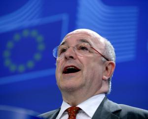 European Union Competition Commissioner Joaquin Almunia holds a news conference regarding...