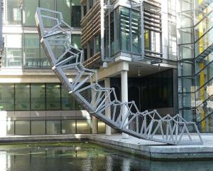 Examples of the work of contemporary British designer  Thomas Heatherwick. The Rolling Bridge,...