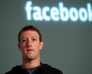 Facebook CEO Mark Zuckerberg listens to a question after introducing a new feature called 'Graph...