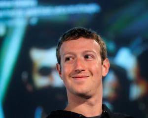 Facebook CEO Mark Zuckerberg listens to a question during a media event at Facebook headquarters...