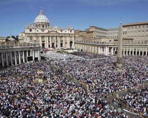 Faithful crowd St. Peter's Square at the Vatican in Rome on for the batification of Pope John...