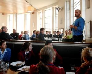 Former All Black captain Anton Oliver talks to secondary school pupils  at the Customhouse Cafe...