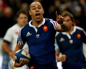 France's Gael Fickou on his way to the try line against England. REUTERS/Benoit Tessier