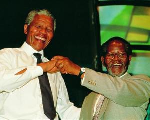 Friends and comrades Nelson Mandela and Oliver Tambo in 1990 in an image from <i>Mandela: In...