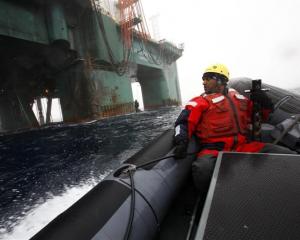 Greenpeace head Kumi Naidoo prepares to do battle last month in a Greenpeace oil protest in the...