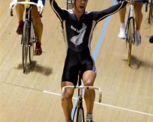 Greg Henderson celebrates after winning the scratch final at the 2004 world championships in...