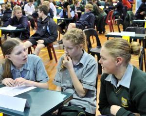 Heads together  ...   Bayfield High School pupils (from left) Hannah McGregor, Neive Nicholas and...