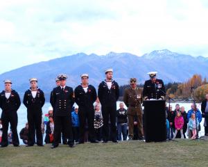HMNZS Otago executive officer Lieutenant Nathan Vink (RNZN) addresses a crowd of thousands during...