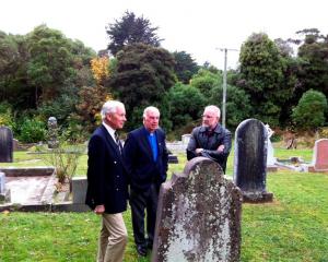Inspecting war graves at Warringtons St Barnabas Church are (from left)  Commonwealth War Graves...