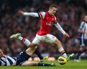 Jack Wilshere in action for Arsenal against West Bromwich 
...