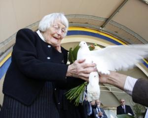 Jean Hubbard releases a dove in memory of her late husband, Allan Hubbard, who died in a car...