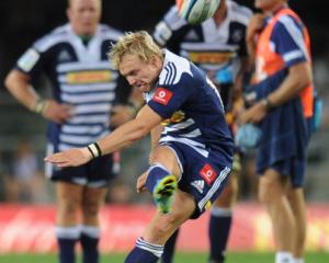 Joe Pietersen of the Stormers kicks for goal against the Sharks in their Super 15 match in Cape...