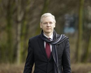 Julian Assange arrives for his extradition hearing at Belmarsh Magistrates' Court in London.  (AP...