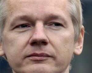 Julian Assange faces the media after making an appearance at Belmarsh Magistrates' Court in...