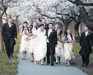 Keagan Ho and Michelle Soakell with their wedding party after their marriage in Christchurch last...
