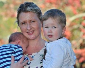 Kim Woods with children Hudson (1) and Corban (1 week) at their Glenross, Dunedin, home yesterday...