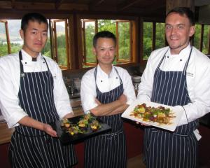 Kobe Cuisine head chef Yuki Ariya (centre) with chef Kensaku Yanagimura (left) and chef de partie...