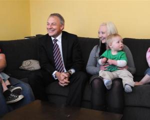 Labour leader Phil Goff (centre) with members of the Campbell family, from left, Jesse-James (2),...