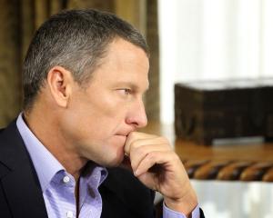 Lance Armstrong is interviewed by Oprah Winfrey in Austin, Texas, in this handout photo courtesy...