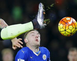 Leicester City's Jamie Vardy avoids the boot of Manchester City's Nicolas Otamendi. Photo Reuters