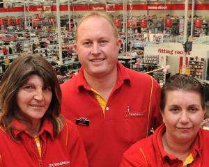 Long-serving  staff members of  The Warehouse (from left) Sharon Giggins, Gareth Michelle and...