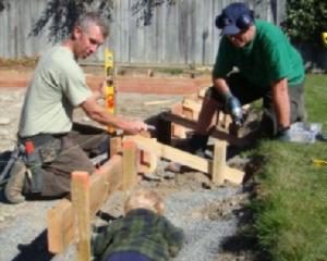 Mackenzie Landsar chairman Rob Davis (left) and Twizel Police Constable Joe Rush get a little...