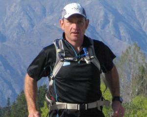 Mal Law grinds out another day on the marathon trail. Photo by www.7in7.org.nz