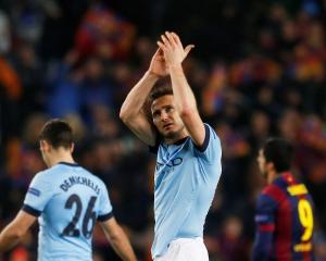 Manchester City's Frank Lampard applauds fans at the end of the match against Barcelona at the...