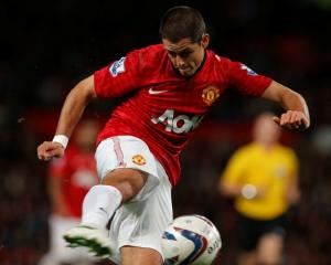 Manchester United's Javier Hernandez shoots at goal during their English League Cup match against...