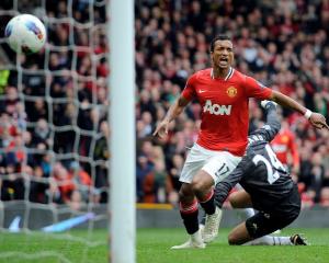 Manchester United's Nani celebrates scoring against Everton during their Premier League match in...