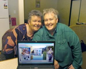 Mandy Vicars (left) and Jill Jones in a Dunedin motel after being forced from their Long Beach...